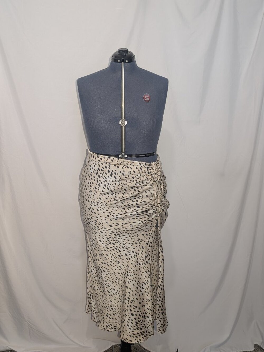 Slip skirt with thigh split and adjustable ruching